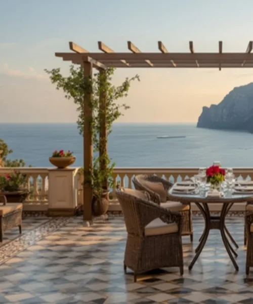 Chiavi MICHELIN 2026: terrazza di un hotel italiano di alta gamma affacciata sul mare
